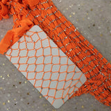 Legs that Sparkle: Rhinestone-Adorned Thigh High Fishnets